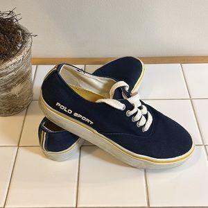 Navy Ralph Lauren Polo Sport sneakers w/yellow stripes, trim & insoles.